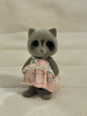 Flocked Raccoon Figure with Pink Floral Dress